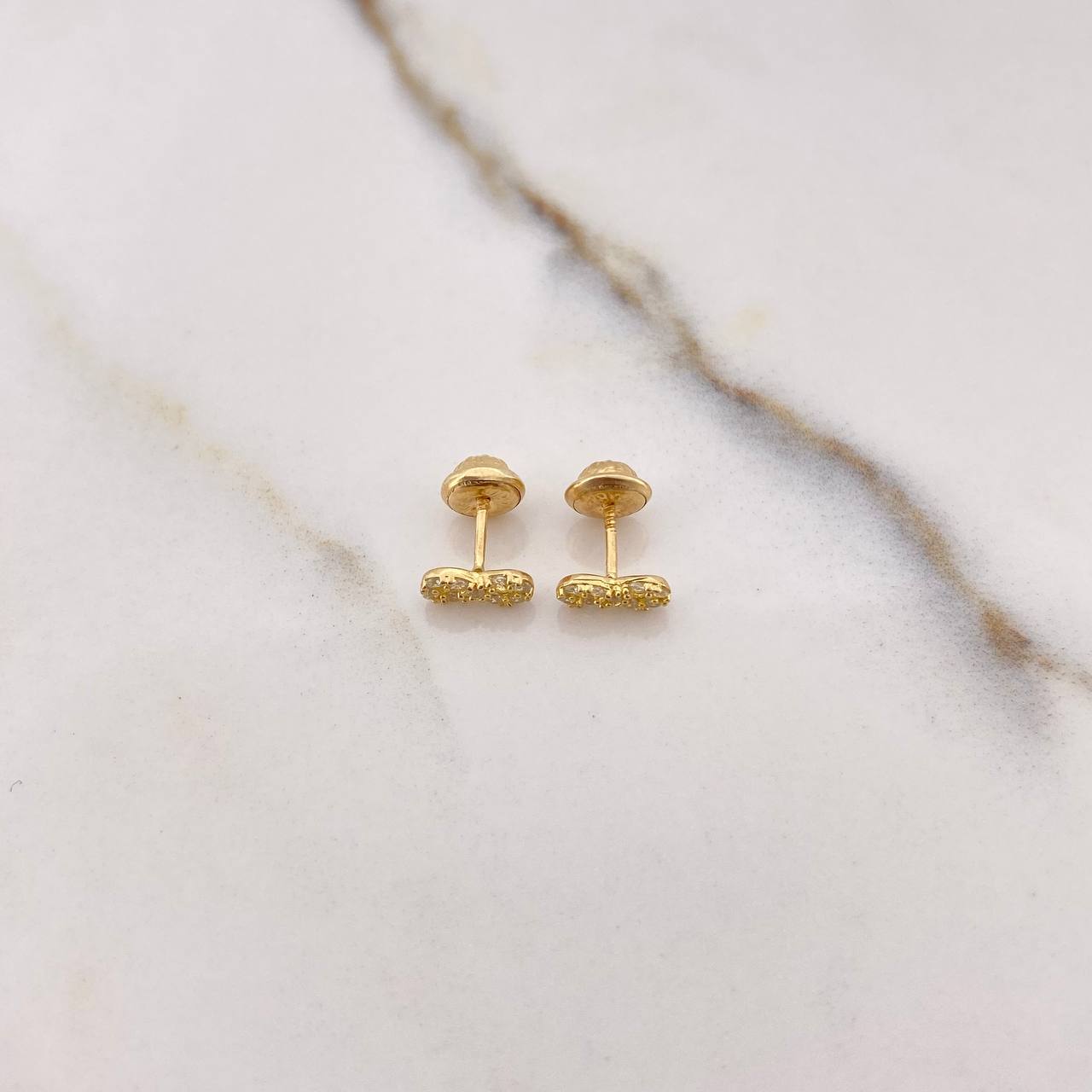 Topos Infinito 0.8gr / Circones Blancos Oro Amarillo $