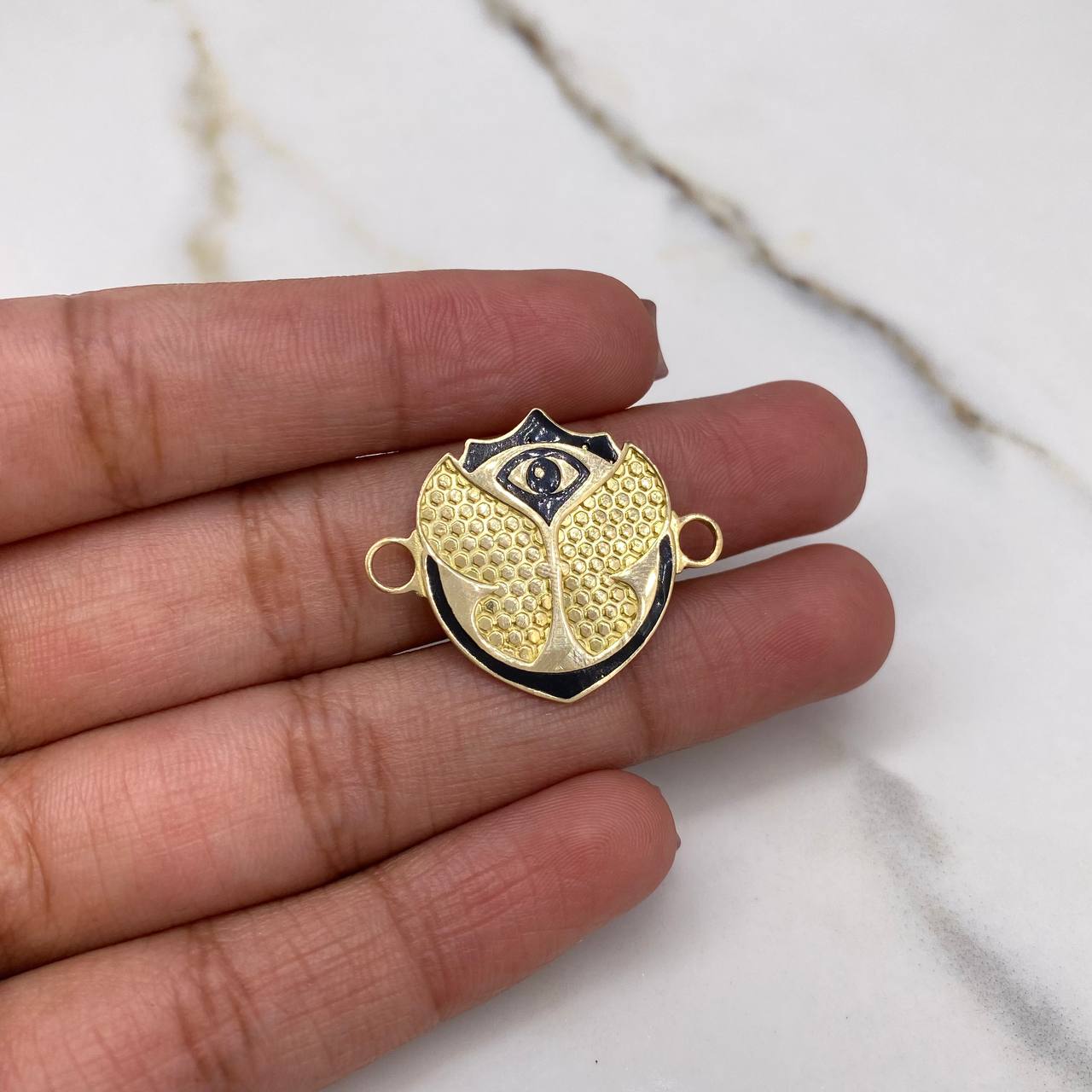 Herraje Tomorrowland 3.7gr / 2.8cm / Oro Amarillo 18K $