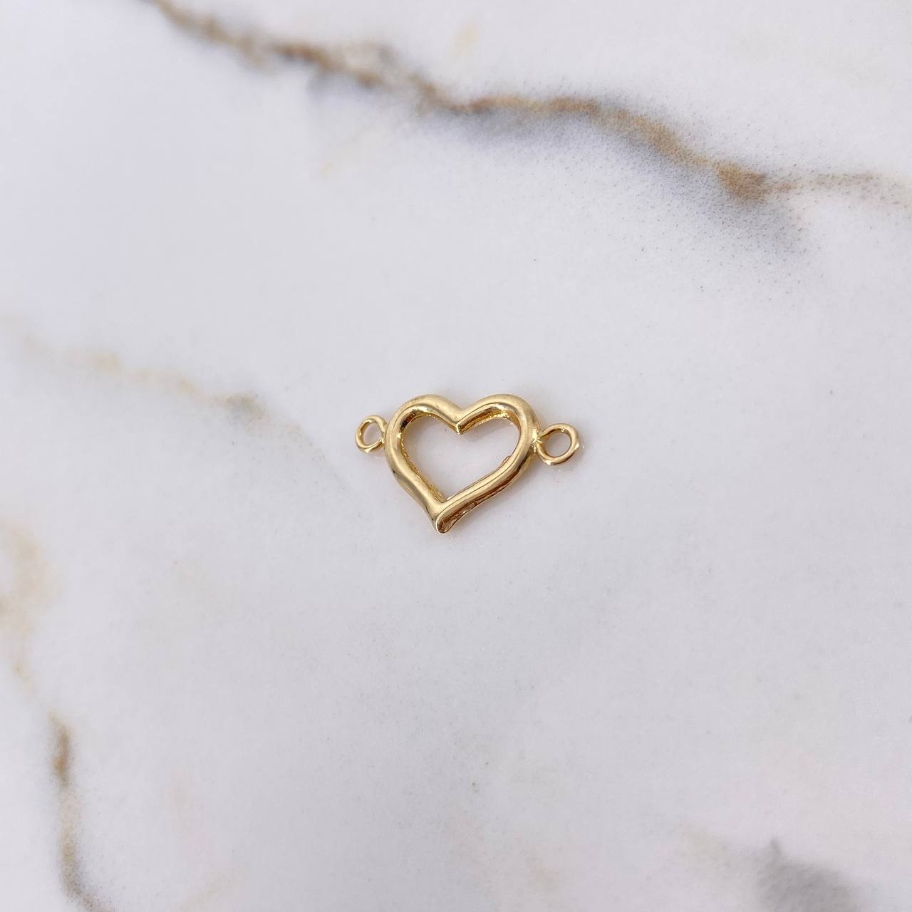 Herraje Silueta Corazon 1.25gr / 2.3cm / Liso Oro Amarillo $