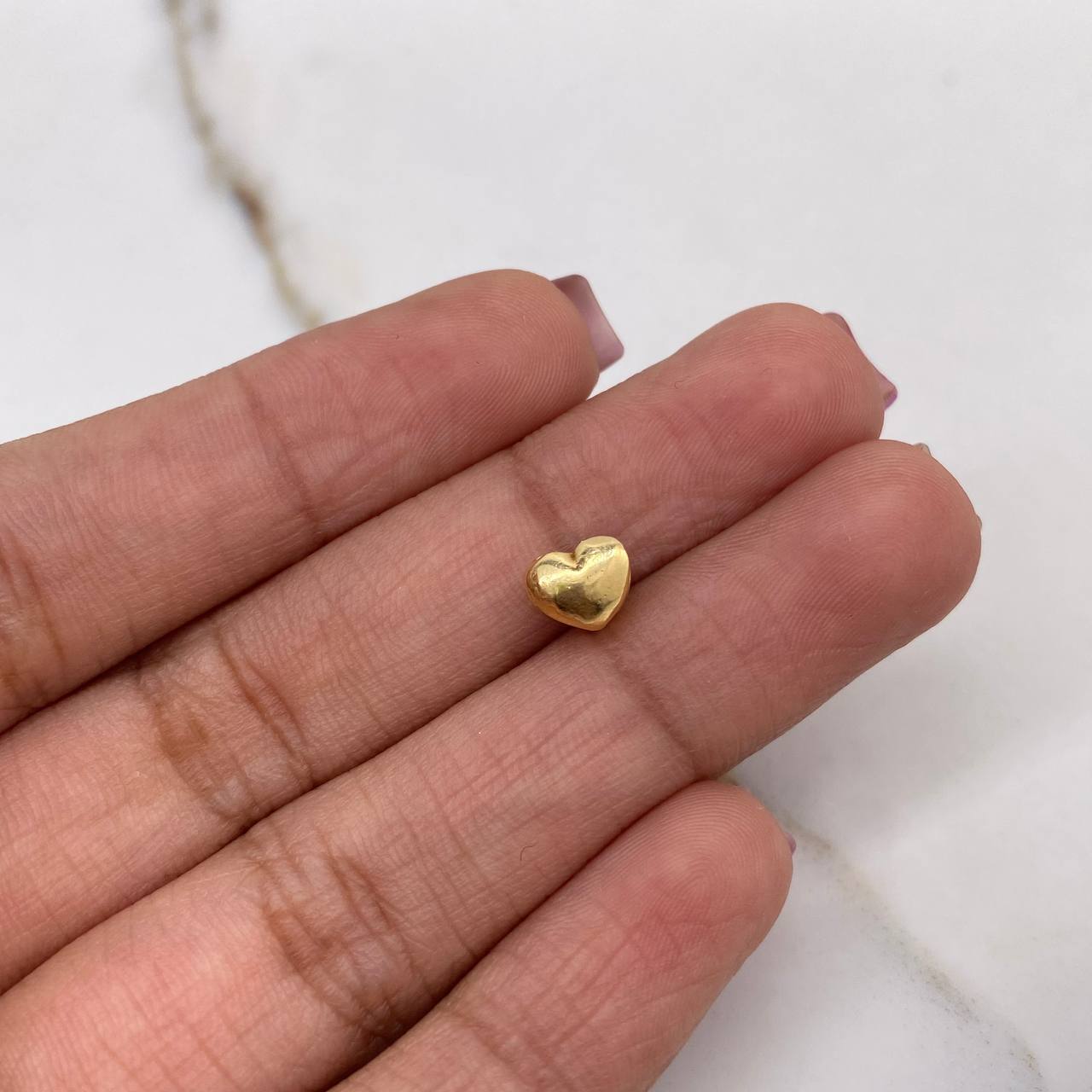 Herraje Corazon Tambor 0.65gr / 0.5cm / Oro Amarillo $
