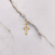 Dije Silueta Cruz 0.7gr / 2.1cm / Diamantado Oro Amarillo $