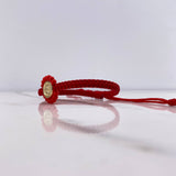 Pulsera Roja Herraje Letra E 0.55gr / 1cm / Tambor Mostacilla Checa Roja Oro Amarillo $