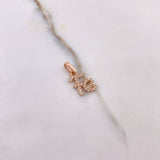 Dije Fe 0.9gr / 1.6cm / Circones Blancos Oro Rosa $