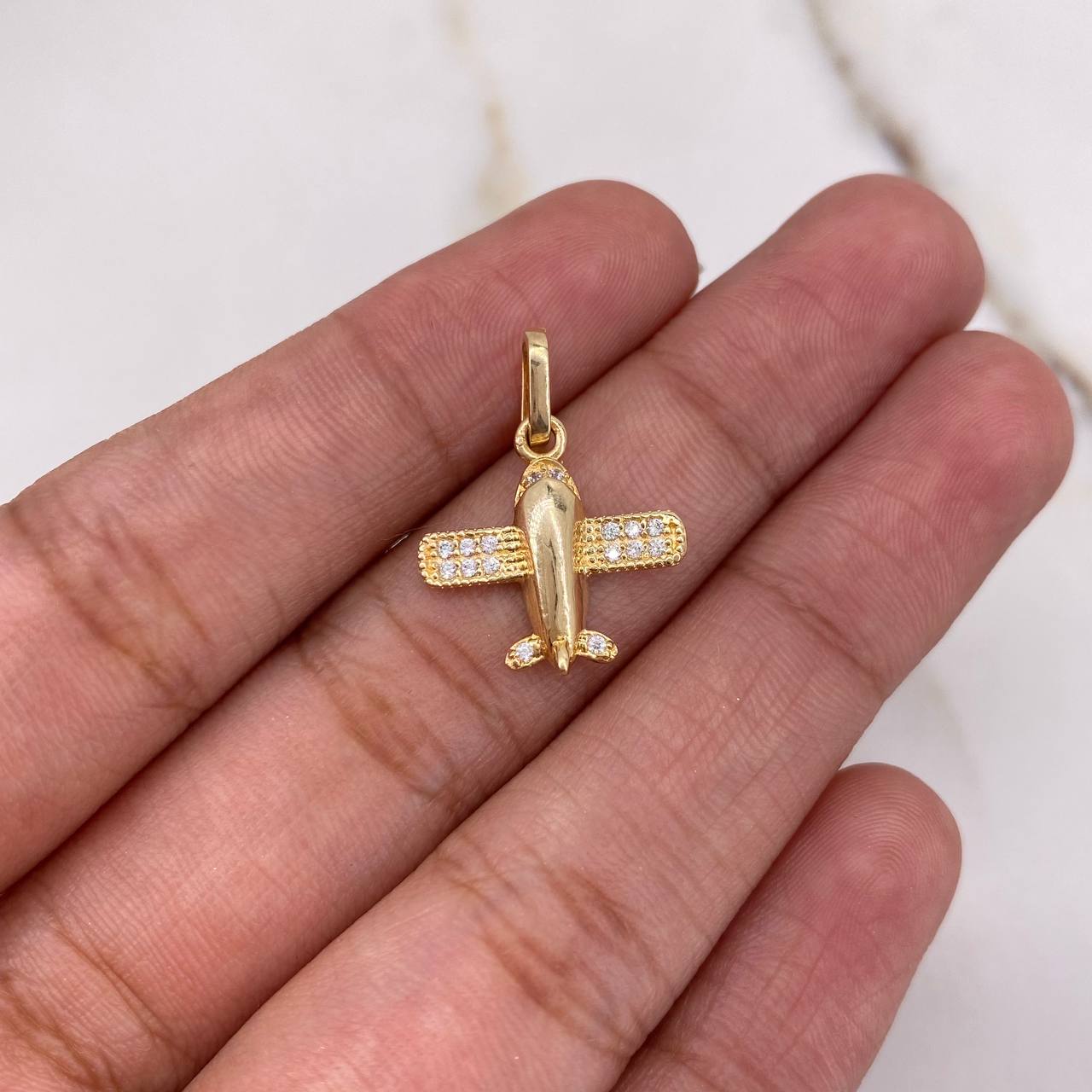 Dije Avion 1.25gr / 1.8cm / Circones Blancos Oro Amarillo $