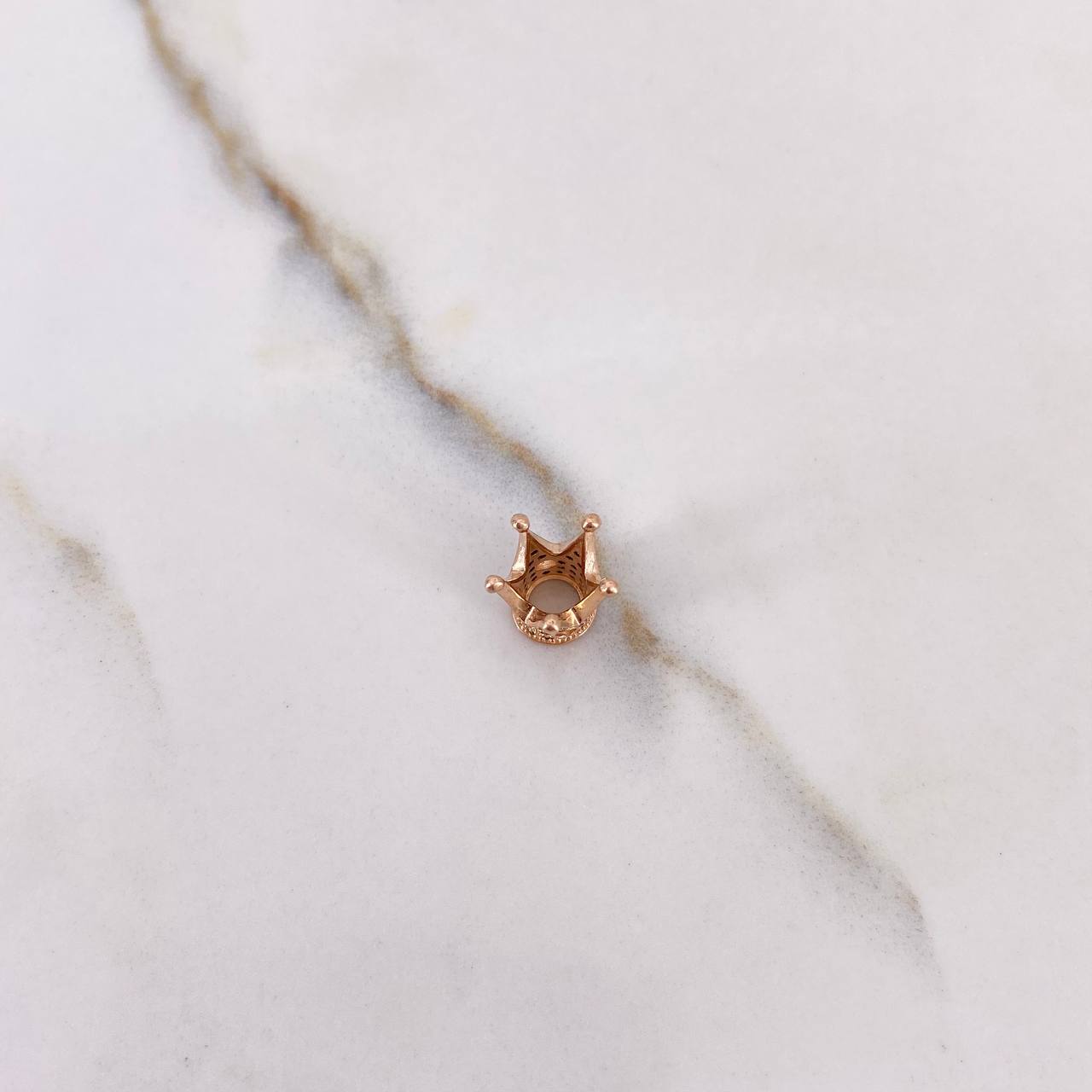 Herraje Corona 1.25gr / 1cm / Circones Negros Oro Rosa $