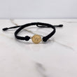 Pulsera Negra Herraje Letra W 0.55gr / 1.5cm / 5mm Troquelado Bolas Neoprenos Negras Oro Amarillo $
