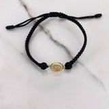 Pulsera Negra Herraje Letra W 0.55gr / 1.5cm / 5mm Troquelado Bolas Neoprenos Negras Oro Amarillo $