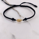 Pulsera Negra Herraje Letra W 0.55gr / 1.5cm / 5mm Troquelado Bolas Neoprenos Negras Oro Amarillo $