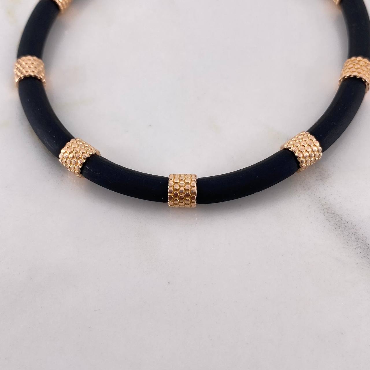Pulso Silicona Cilindros 10gr / 19cm / 5mm Negro Oro Rosa $