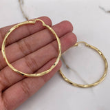 Candongas Mai 3.6gr / 4.9cm / Rayadas Oro Amarillo $