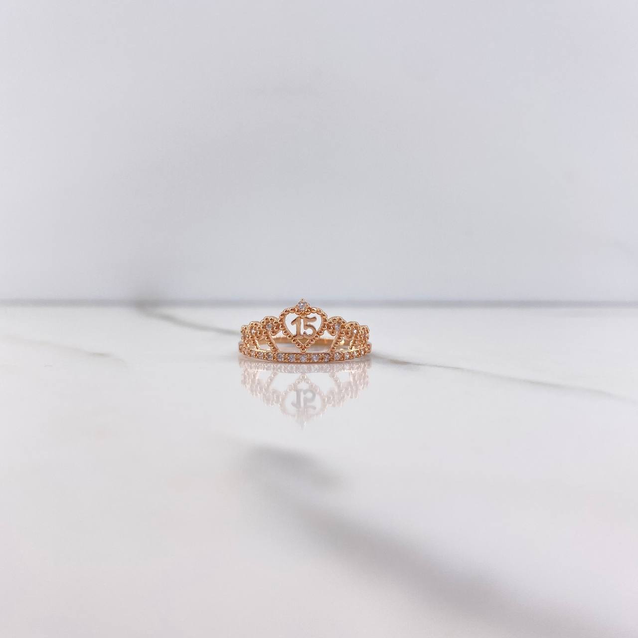 Anillo Corona 15s 1.8gr / T7 1/4 / Circones Blancos Oro Rosa $
