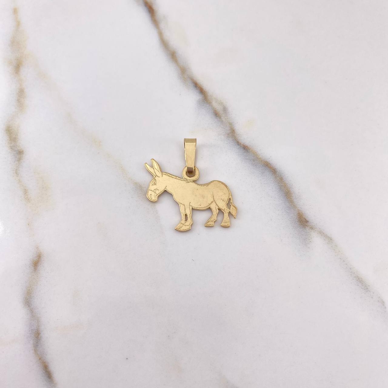 Dije Burro 2.9gr / 2.5cm / Oro Amarillo $