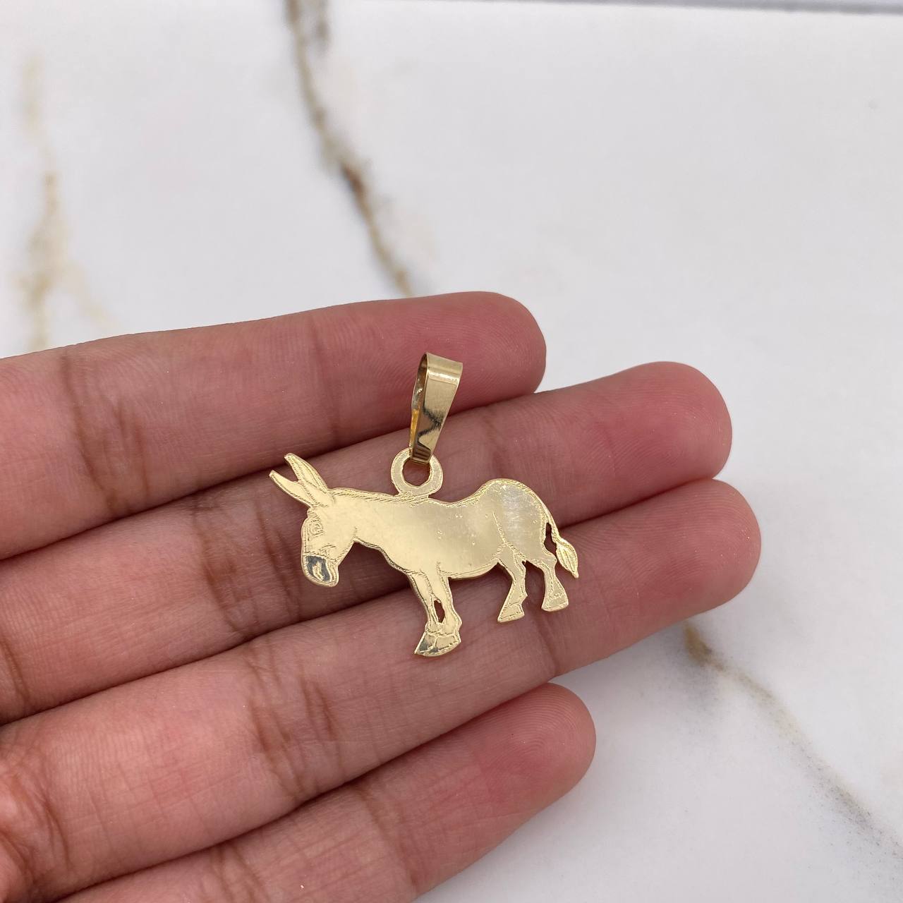 Dije Burro 2.9gr / 2.5cm / Oro Amarillo $