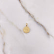 Dije San Benito 0.85gr / 1.6cm / Plano Oro Amarillo $