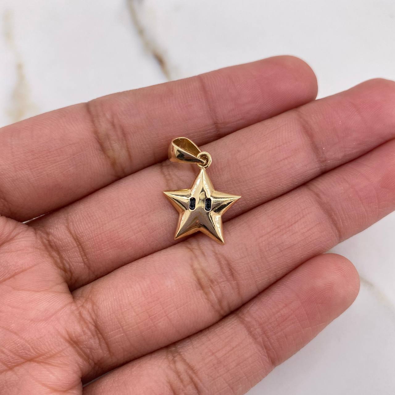 Dije Estrella 1.15gr / 2cm / Liso Oro Amarillo $