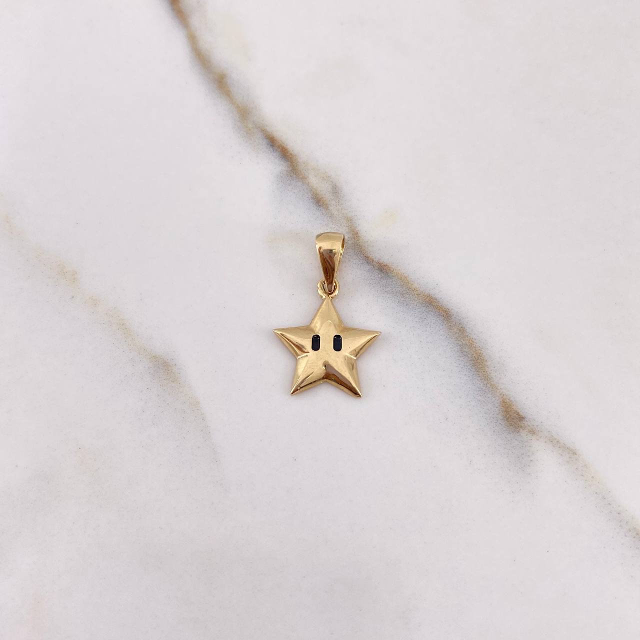 Dije Estrella 1.15gr / 2cm / Liso Oro Amarillo $
