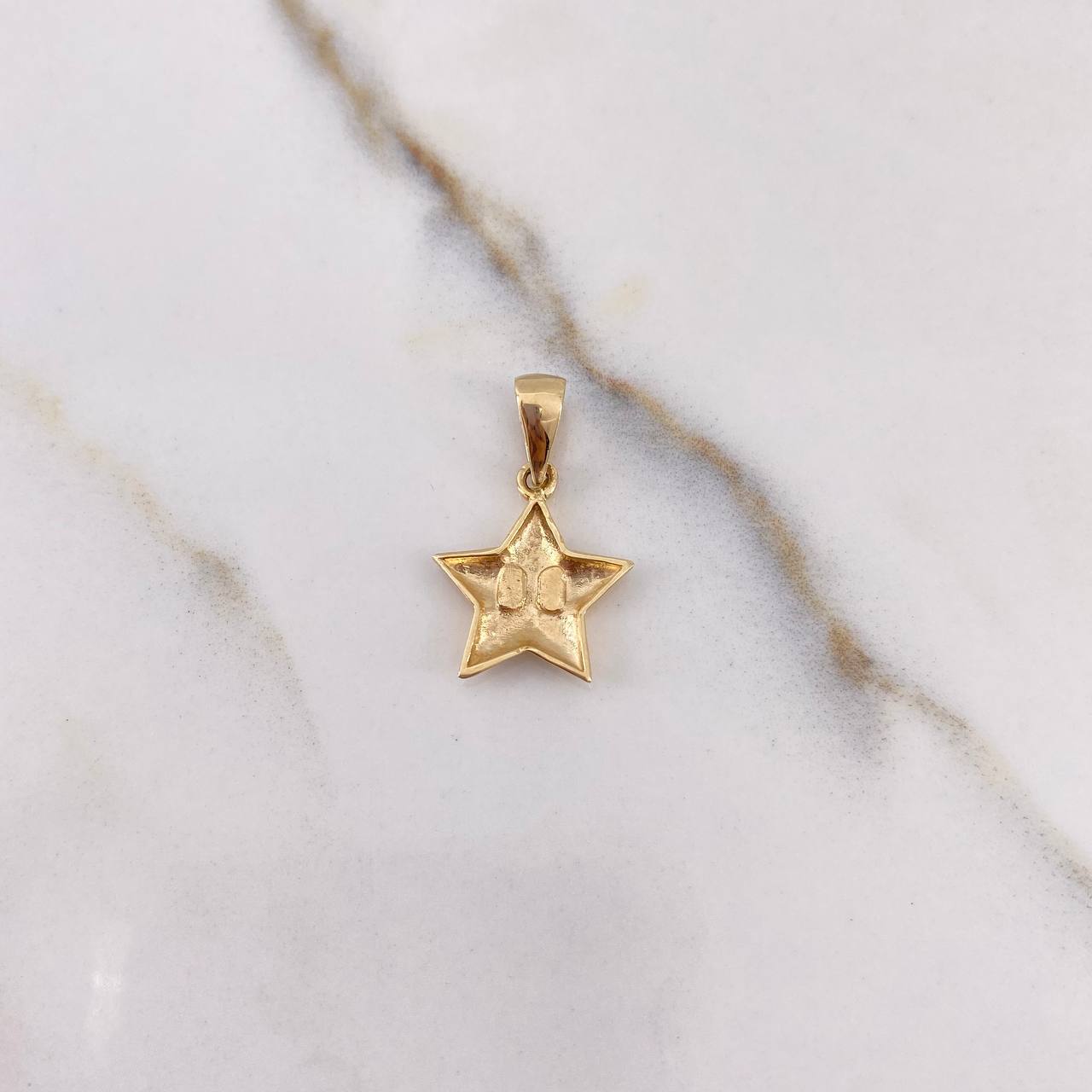 Dije Estrella 1.15gr / 2cm / Liso Oro Amarillo $