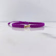 Pulsera Morada Bolas Diamantadas 0.15gr / 3mm Oro Amarillo $