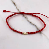 Pulsera Roja Bolas Diamantadas 0.15gr / 3mm Oro Amarillo $