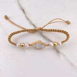 Pulsera Beige Trebol 3.35gr / 5mm Resina Blanca Bolas Lisas Oro Rosa Nac.Esp. $