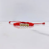 Pulsera Roja Mostazilla 0.35gr / 4mm Bolas Lisas Oro Amarillo $