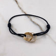 Pulsera Negra Argollas Tornillo 3.1gr / Lisas Oro Amarillo $