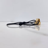 Pulsera Negra Argollas Tornillo 3.1gr / Lisas Oro Amarillo $