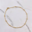 Tobillera Tipo Militar 2.05gr / 25cm / 3mm Bola Diamantada Oro Amarillo $