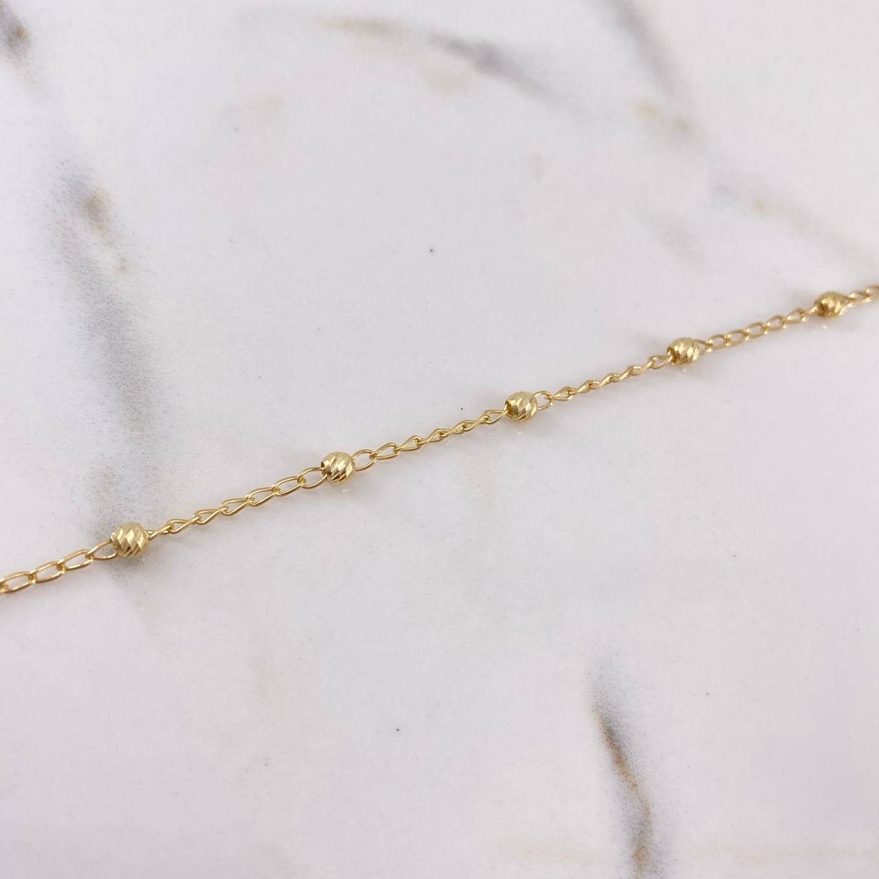 Tobillera Tipo Militar 2.05gr / 25cm / 3mm Bola Diamantada Oro Amarillo $
