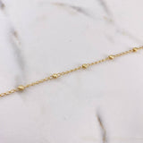 Tobillera Tipo Militar 2.05gr / 25cm / 3mm Bola Diamantada Oro Amarillo $