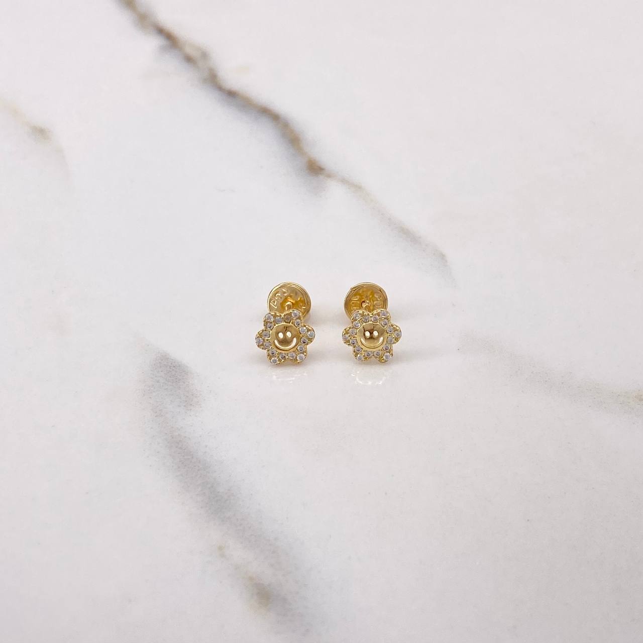 Topos Flor Carita 0.9gr / Circones Blancos Oro Amarillo 18K $