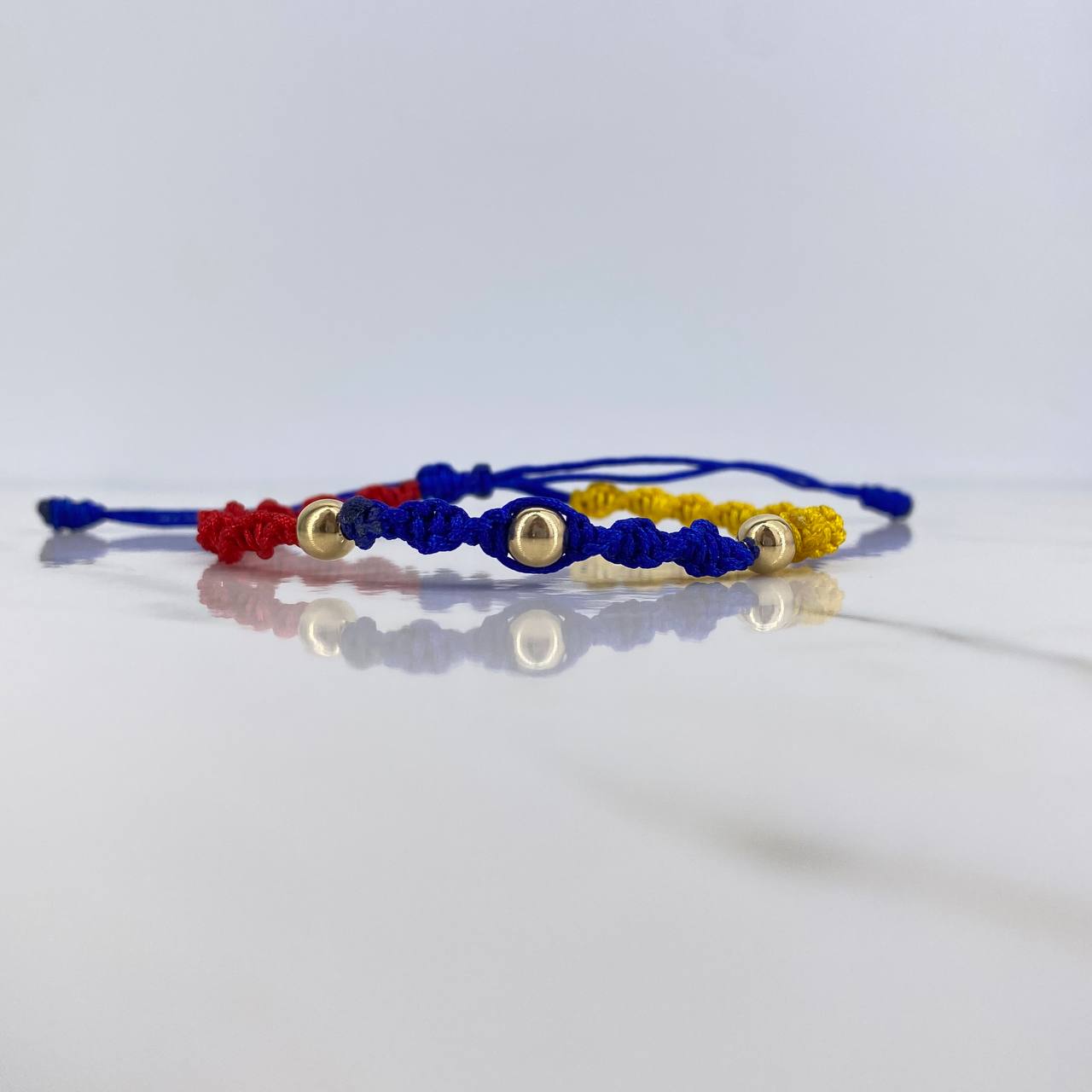 Pulsera Tricolor 0.4gr / 5mm Bolas Lisas Oro Amarillo 18K $