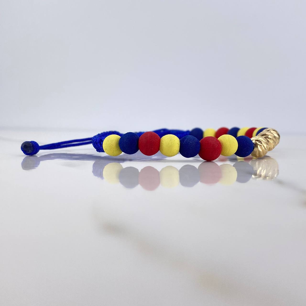 Pulsera Azul 1.2gr / 6mm Bolas Diamantadas Neoprenos Tricolor Oro Amarillo 18K $