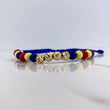 Pulsera Azul 1.2gr / 6mm Bolas Diamantadas Neoprenos Tricolor Oro Amarillo 18K $