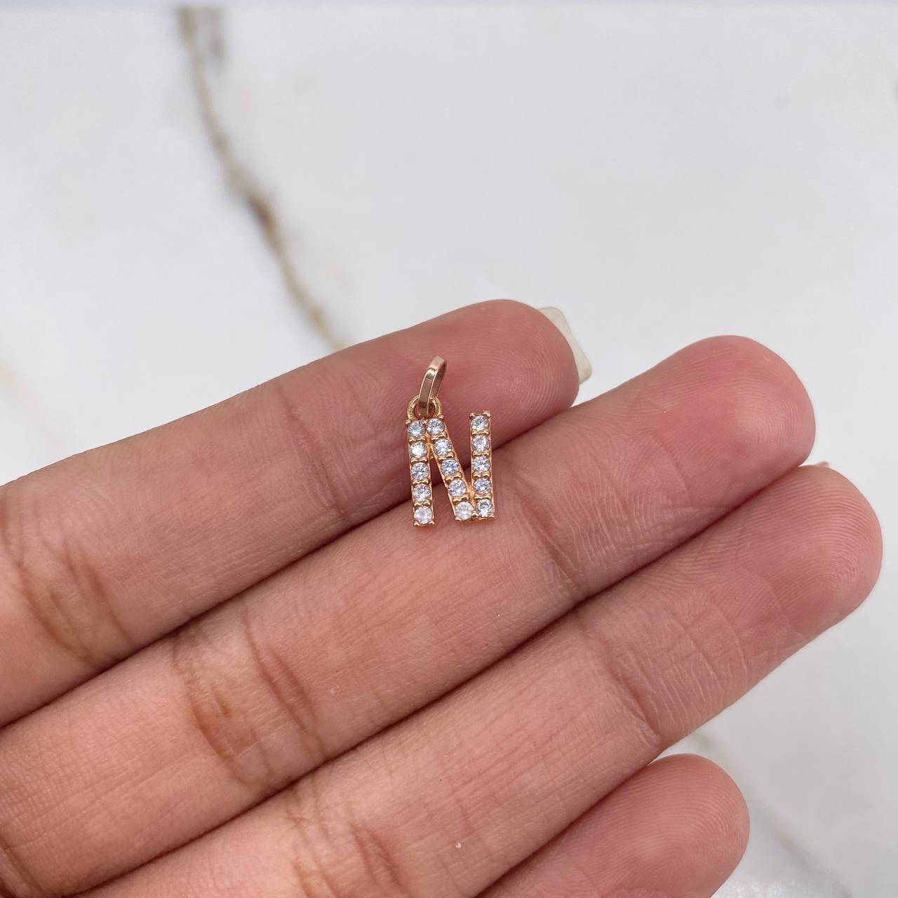 Dije Letra N 0.5gr / Circones Blancos Oro Rosa $