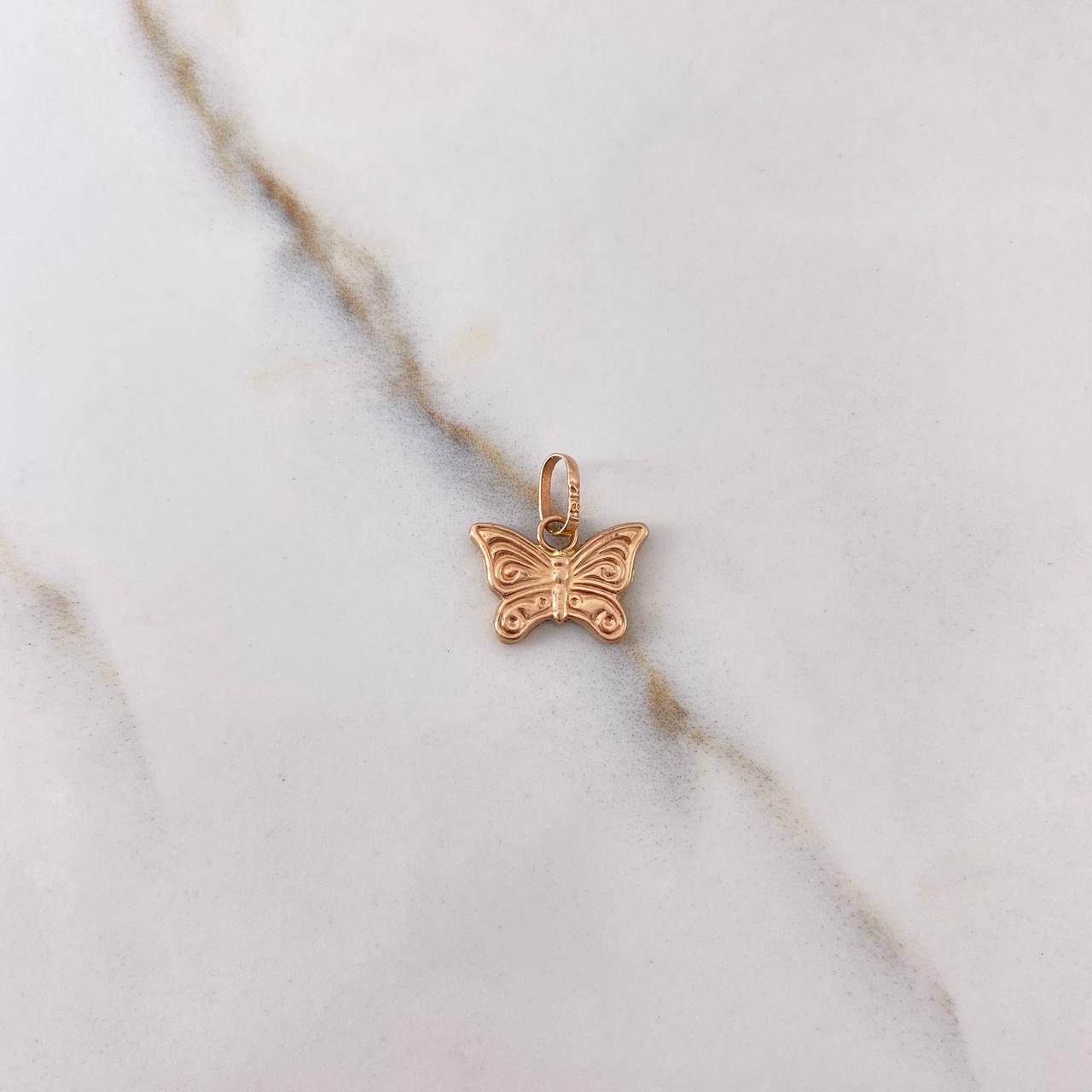 Dije Mariposa 0.45gr / 1.2cm / Oro Rosa $