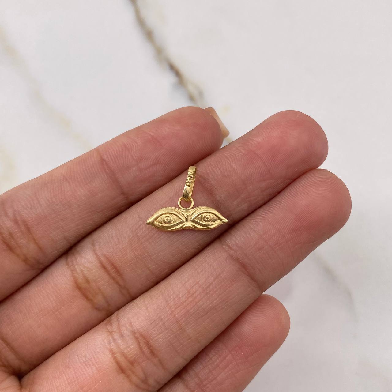 Dije Ojos de Santa Lucía 0.35gr / 1cm / Oro Amarillo $