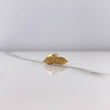 Dije Ojos de Santa Lucía 0.35gr / 1cm / Oro Amarillo $