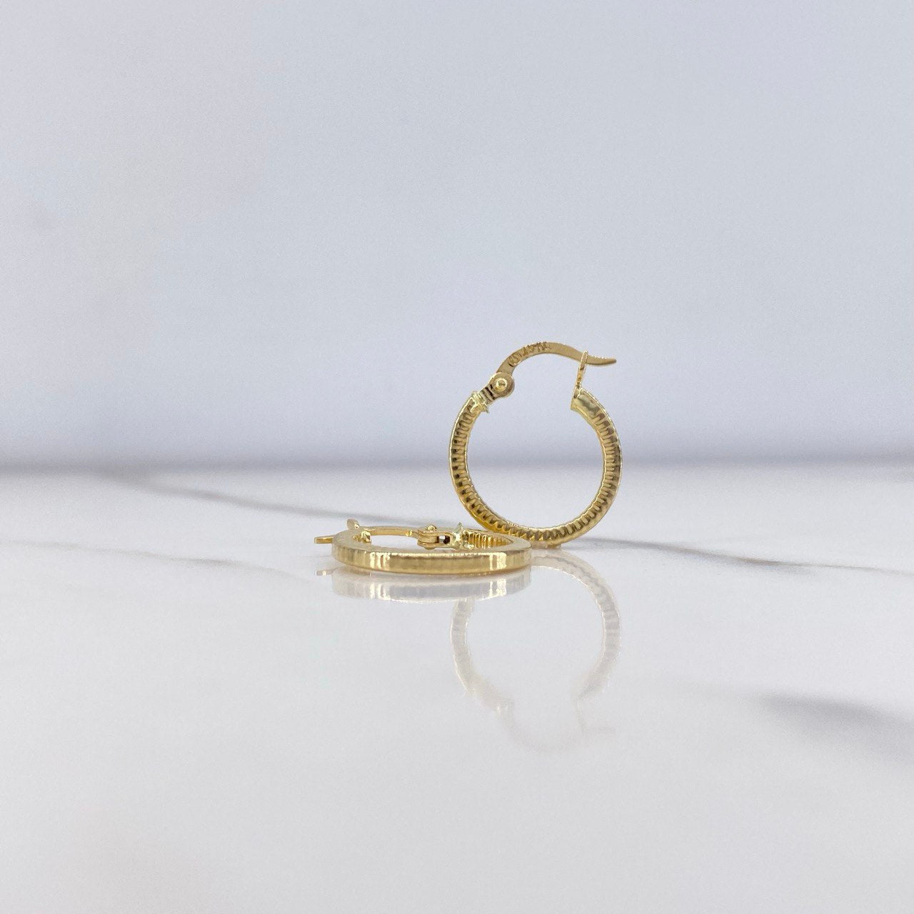 Candongas Maribel 1.2gr / 1.5cm / Rayadas Oro Amarillo $