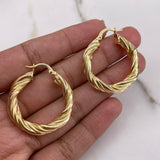 Candongas Rosa 5.25gr / 2cm / Entorchadas Oro Amarillo $