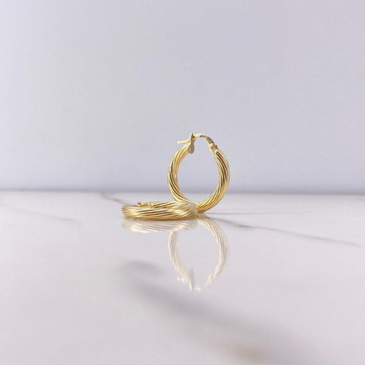 Candongas Sofi 2.25gr / 2cm / Espiral Oro Amarillo $