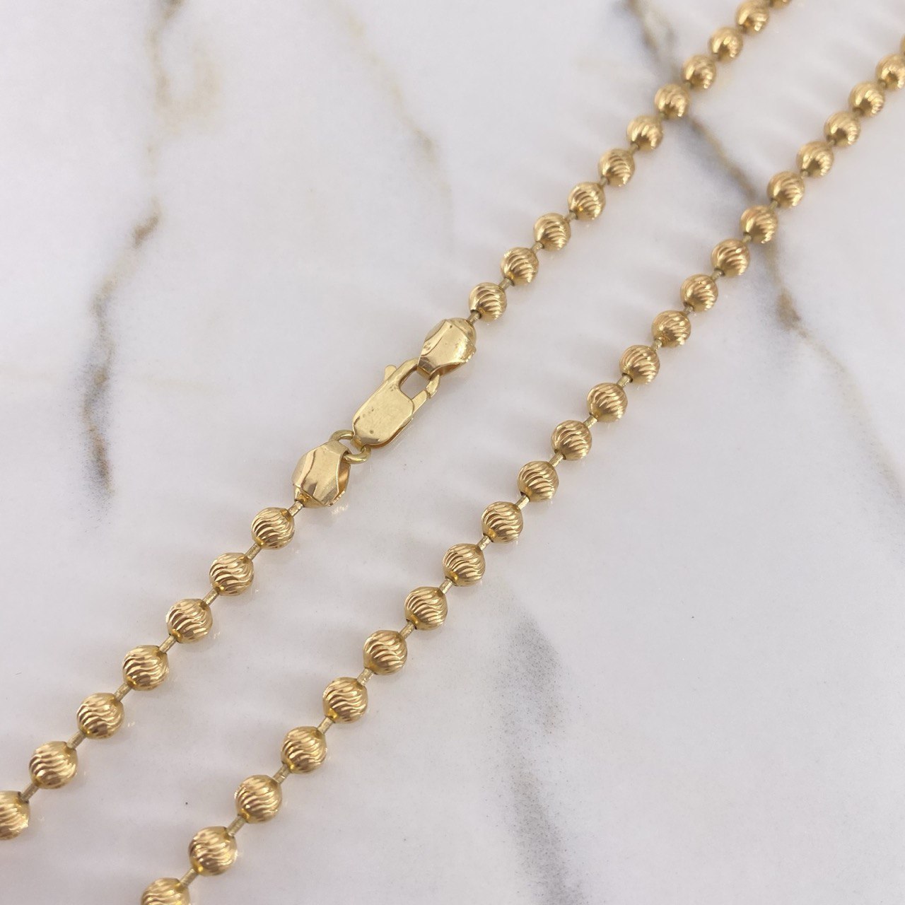 Cadena Militar 24.6gr / 55cm / 3.8mm Bolas Diamantadas Oro Amarillo +3 $