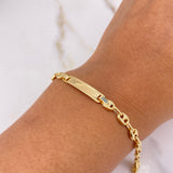 Pulso Bebé GC 2.6gr / 14cm / 4mm Placa Rectangular Bordeada Oro Amarillo $