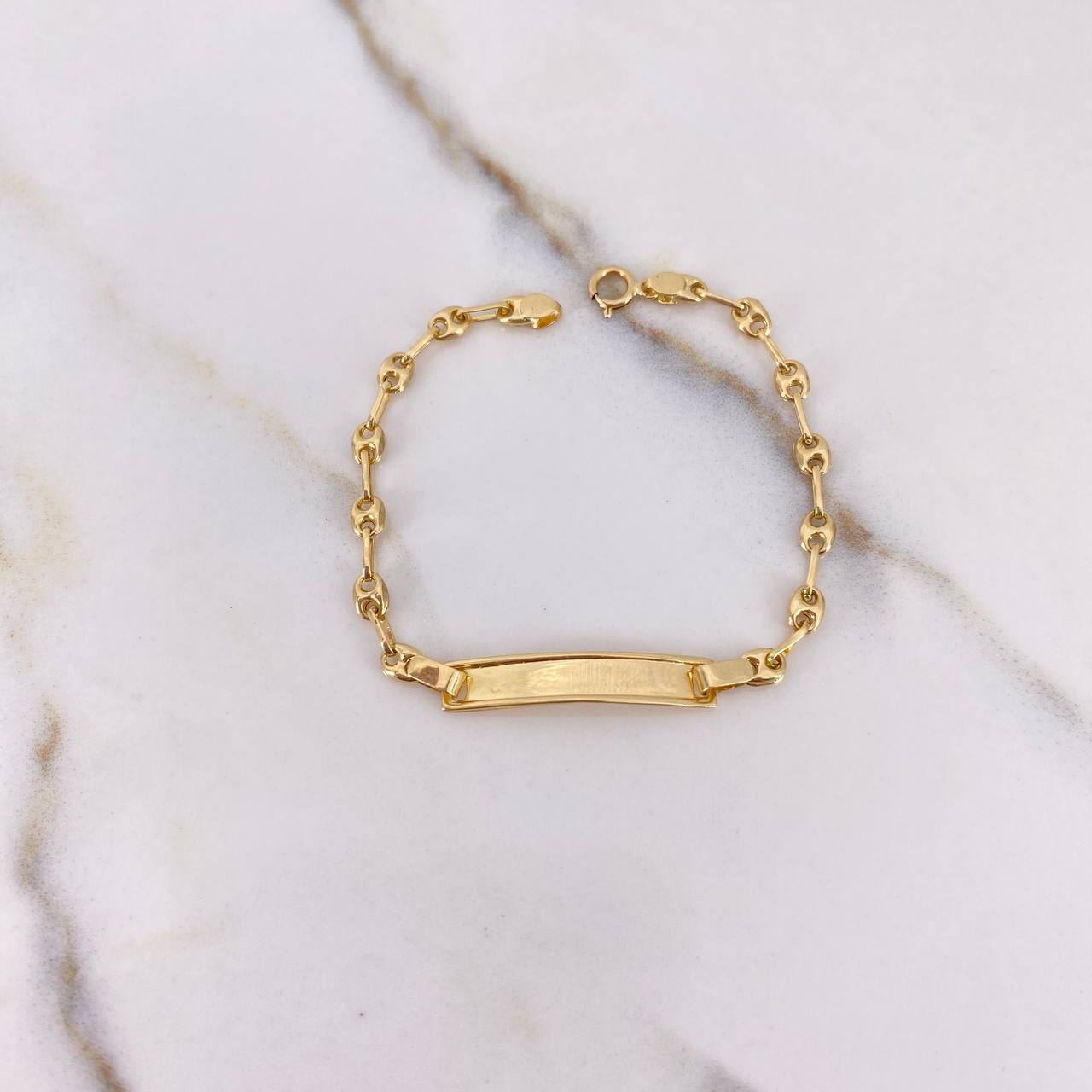 Pulso Bebé GC 1.65gr / 13cm / 3mm Placa Rectangular Bordeada Oro Amarillo $