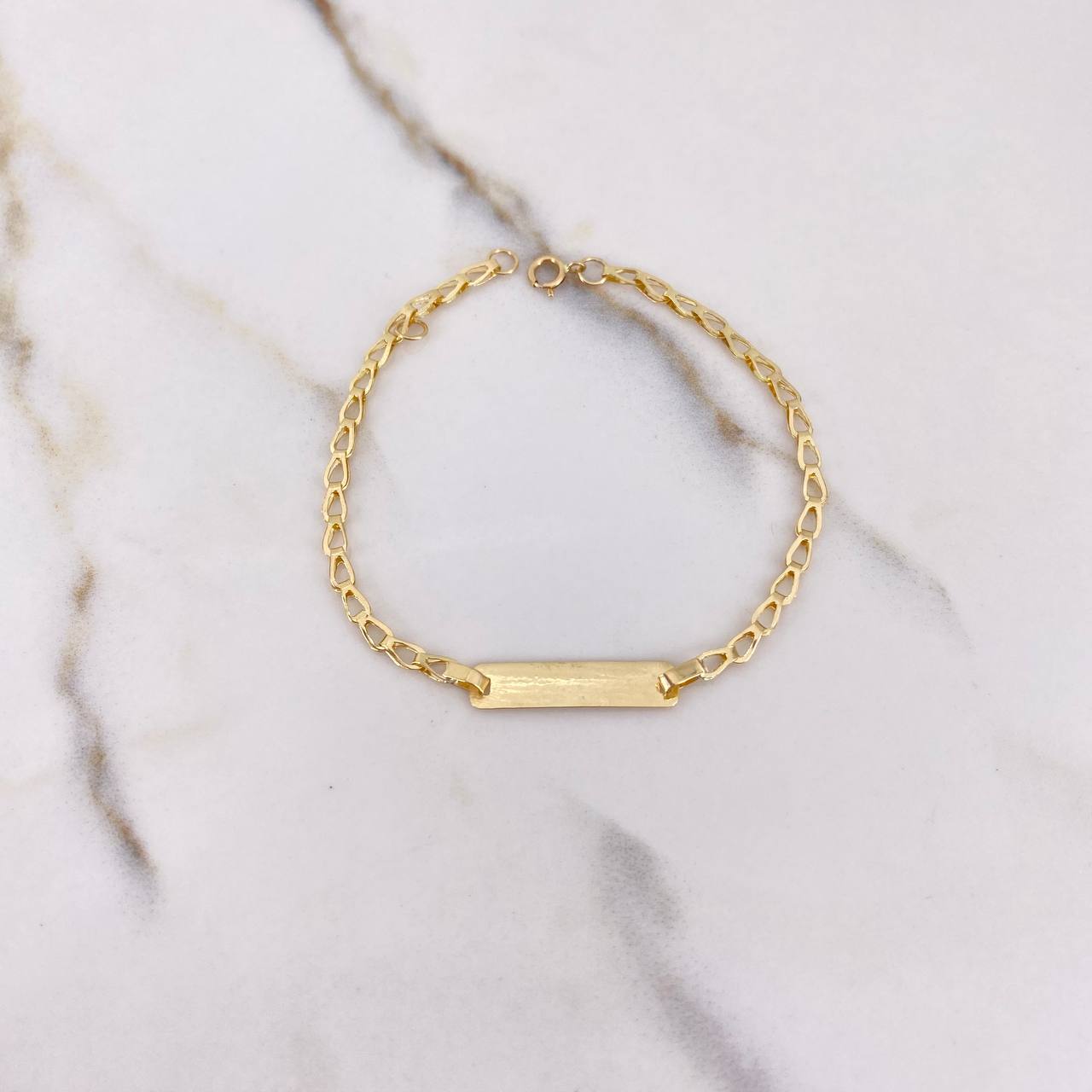 Pulso Bebé Ojiva 1.35gr / 16cm / 3mm Placa Rectangular Lisa Oro Amarillo $