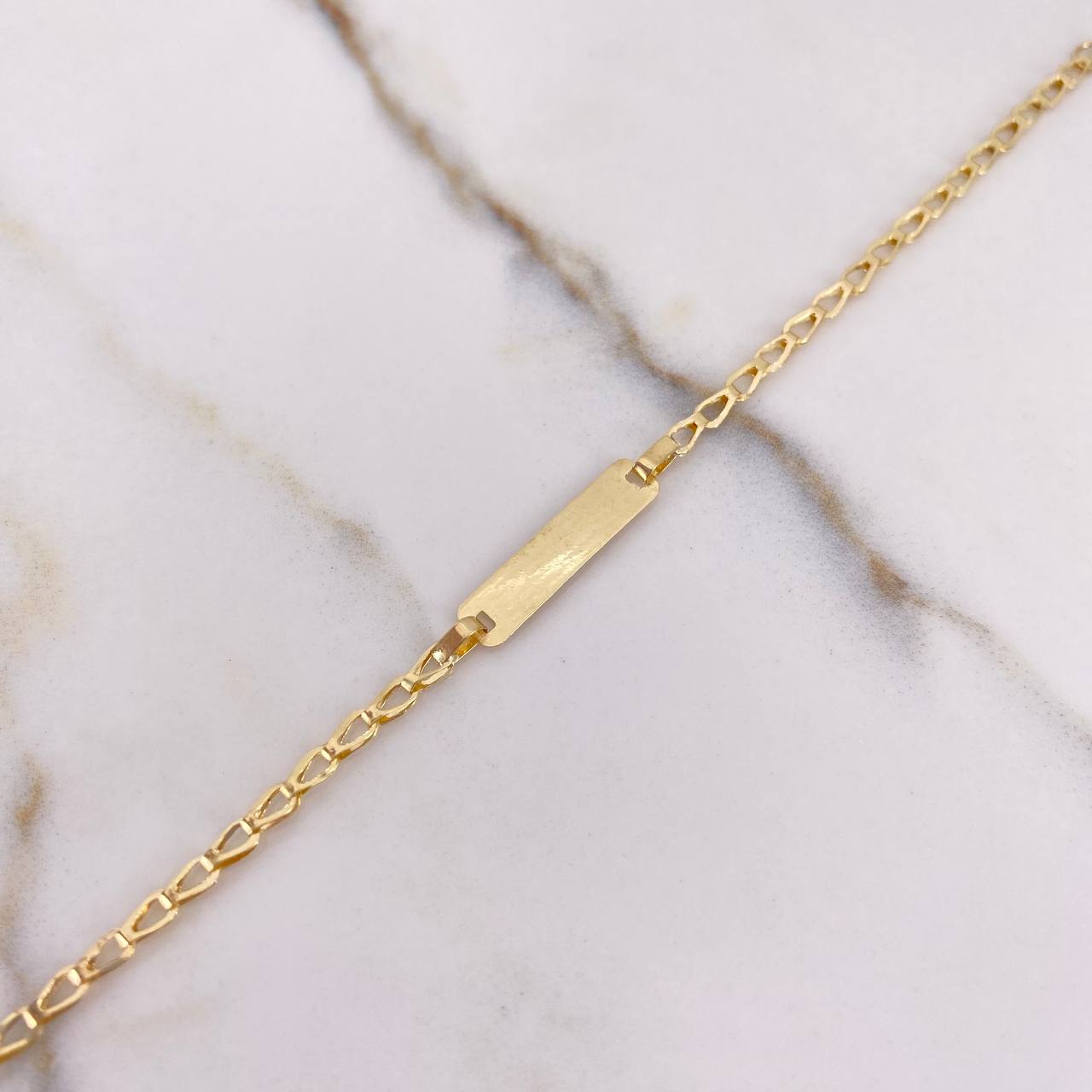 Pulso Bebé Ojiva 1.35gr / 16cm / 3mm Placa Rectangular Lisa Oro Amarillo $
