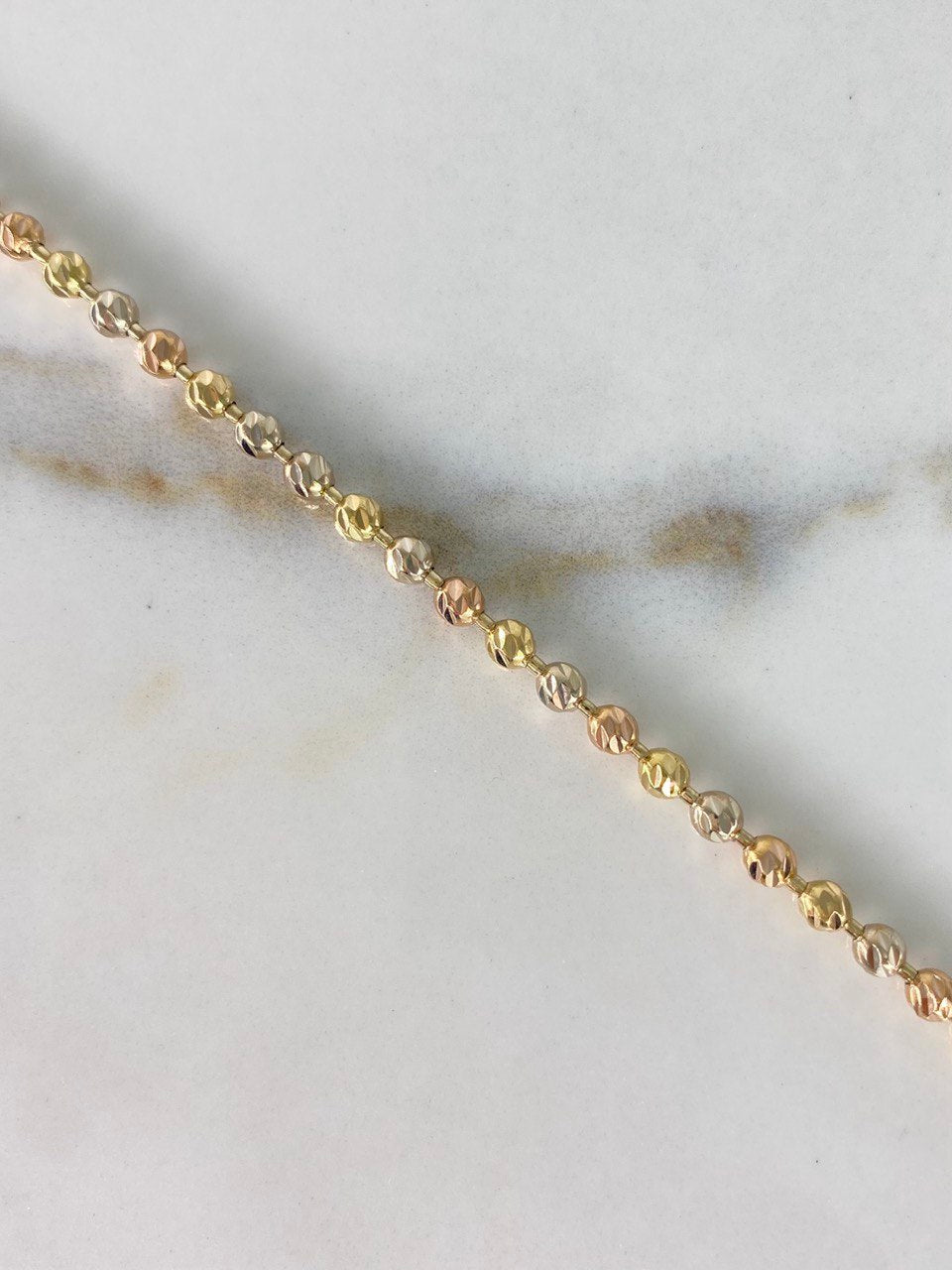 Pulso Militar 7.75gr / 23cm / 3mm Bolas Diamantadas Tres Oros &