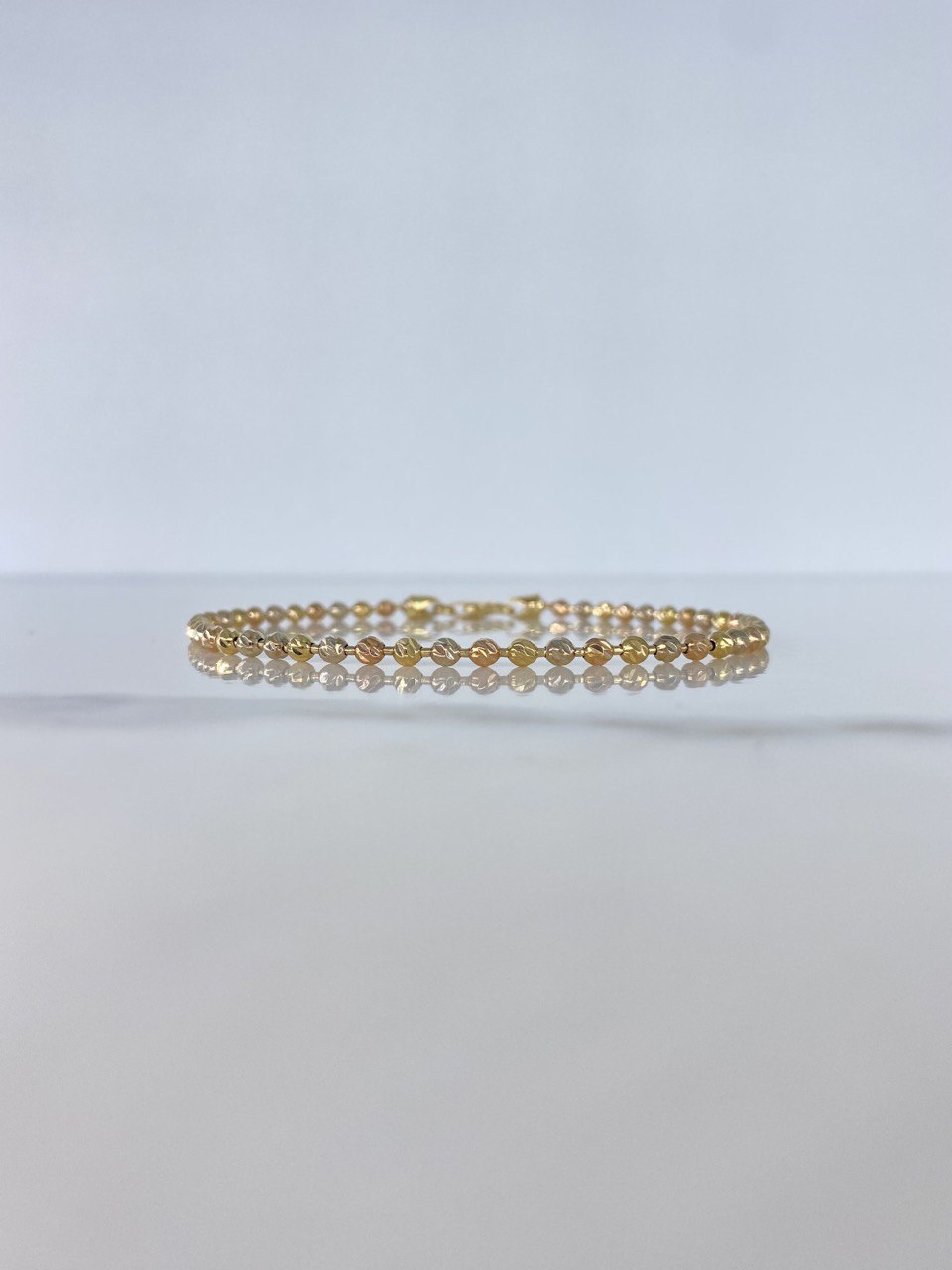 Pulso Militar 7.75gr / 22.5cm / 3mm Bolas Diamantadas Tres Oros &