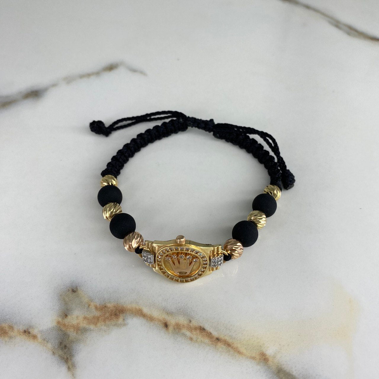 Pulsera Tejida Negra Corona RX Circones 6.8gr / 6mm-8mm Bolas Lisas Diamantadas Tres Oros &