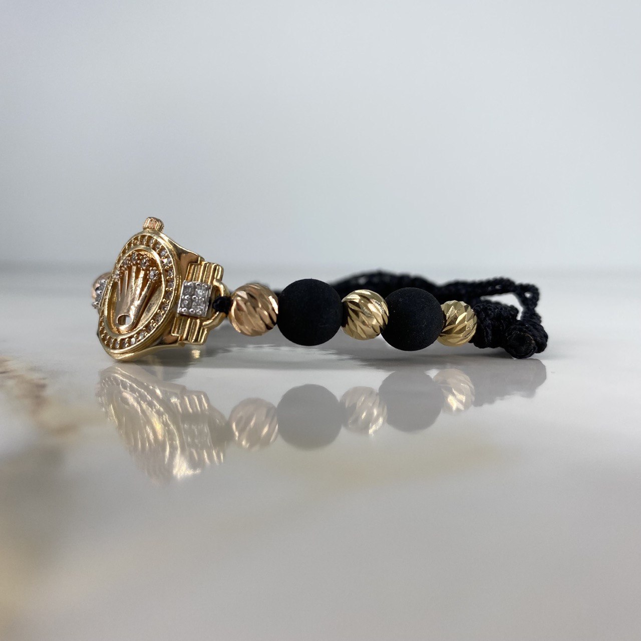Pulsera Tejida Negra Corona RX Circones 6.8gr / 6mm-8mm Bolas Lisas Diamantadas Tres Oros &